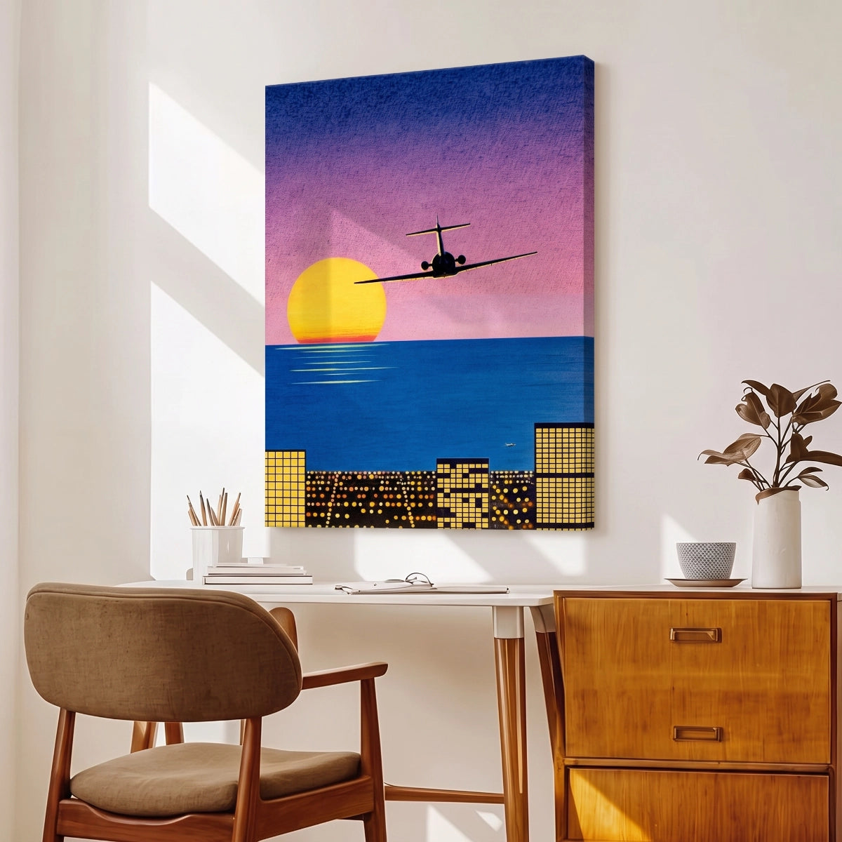 Cuadro de gran formato de atardecer City Pop colgado sobre un escritorio de madera en un estudio de diseño.