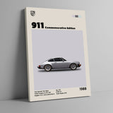 Cuadro decorativo Porsche 911 Commemorative Edition 1988 apoyado sobre pared gris, con bastidor delgado, vista en ángulo