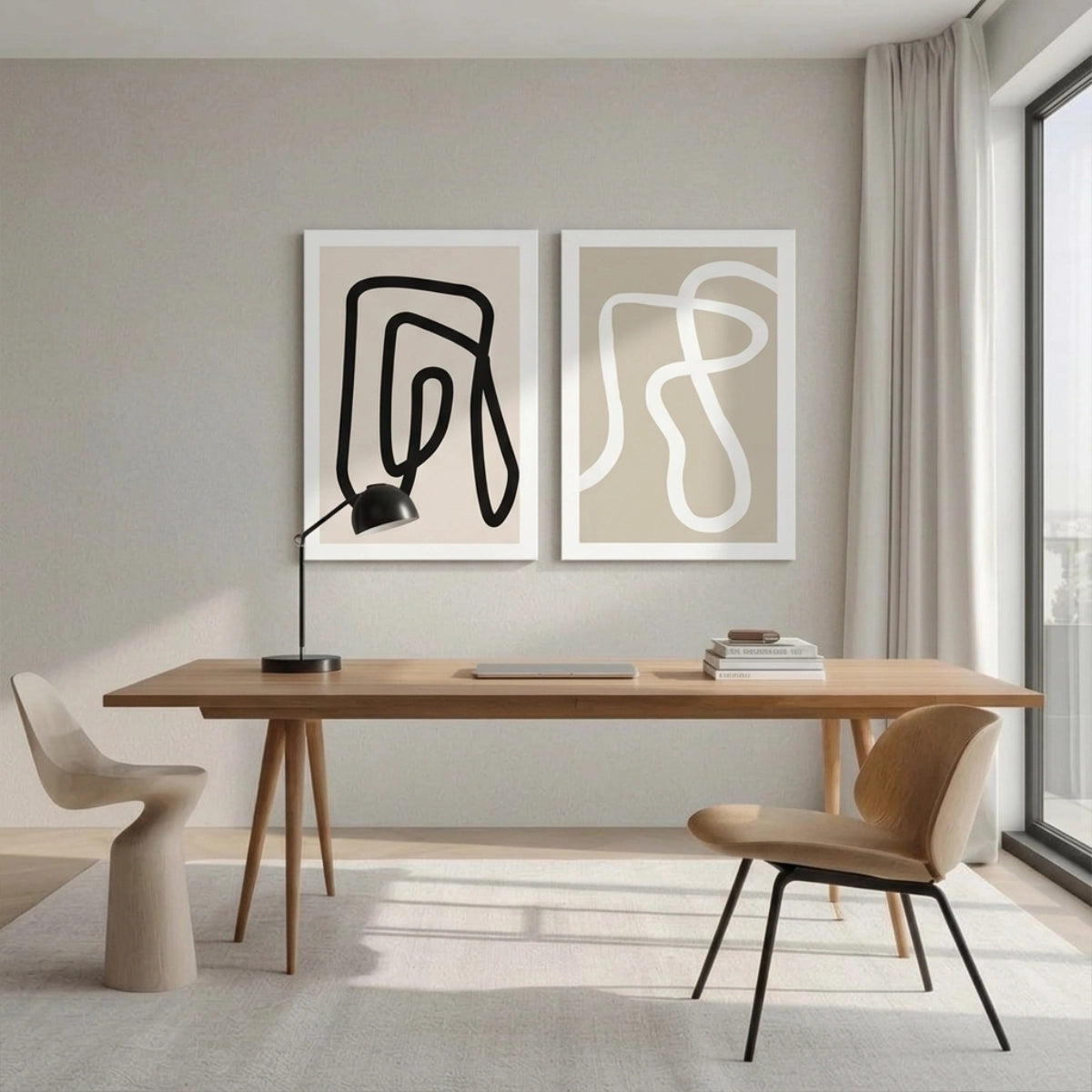 Díptico de cuadros decorativos minimalistas Trazos Fluidos ambientando el espacio de trabajo en una oficina moderna.