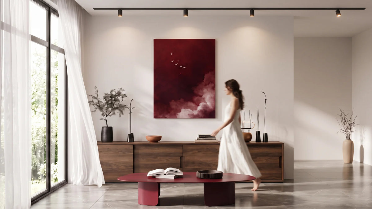 Cuadro decorativo moderno minimalista color rojo, en ambiente sala con mueble de madera y mesa de centro roja.